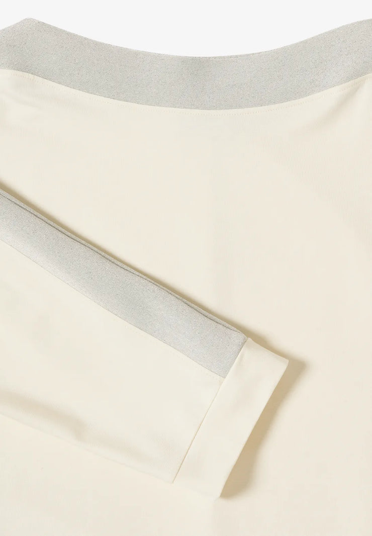 Cecil - Crèmevit topp med fladdermusärm