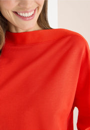 Cecil - Röd topp med fladdermusärm