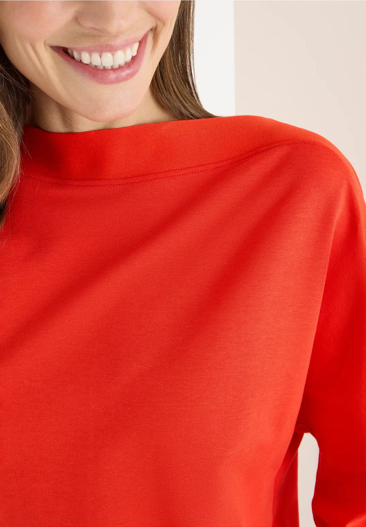 Cecil - Röd topp med fladdermusärm